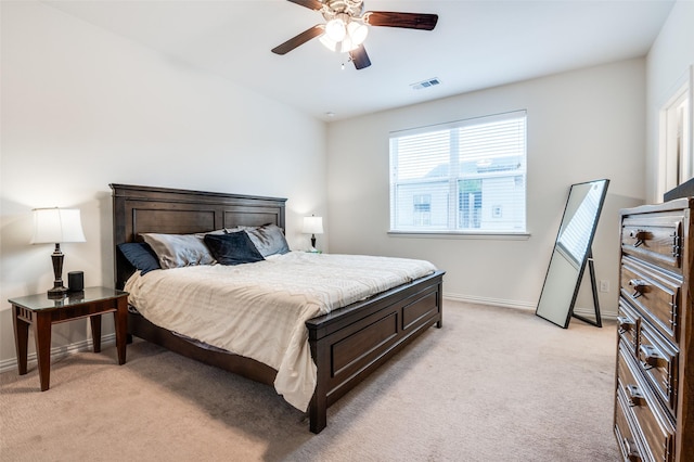 4354 Hebron St, Irving, TX 75061 - bedroom featuring light colored carpet, baseboards, and a ceiling fan