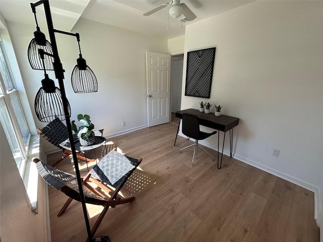 1034 Shawnee Trce, Grand Prairie, TX 75051 - sitting room with light wood finished floors and a ceiling fan