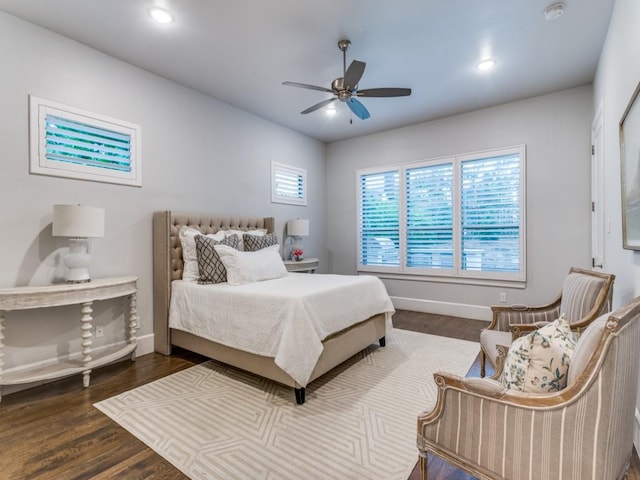 bedroom featuring wood finished floors, baseboards, recessed lighting, and ceiling fan