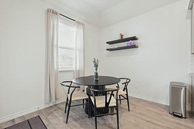 3409 Brady Starr Dr, Aubrey, TX 76227 - dining space featuring baseboards and light wood-style flooring