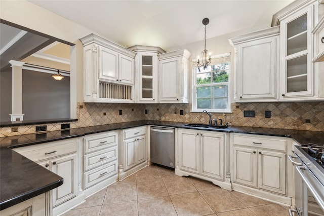 22924 County Road 223, Arp, TX 75750 - kitchen featuring a sink, appliances with stainless steel finishes, a chandelier, dark countertops, and light tile patterned flooring