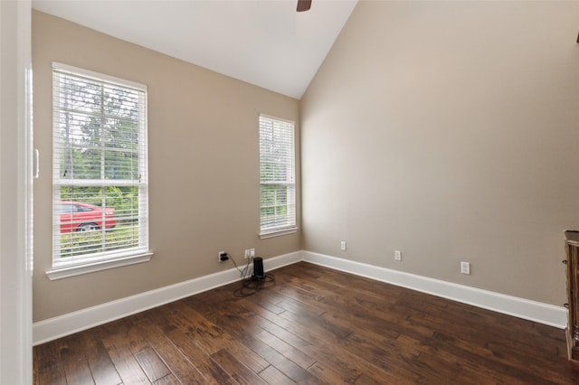 22924 County Road 223, Arp, TX 75750 - unfurnished room with plenty of natural light, baseboards, vaulted ceiling, dark wood-style flooring, and a ceiling fan