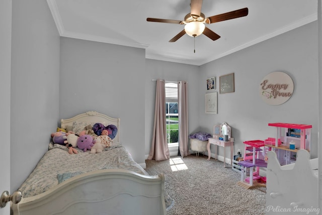 carpeted bedroom with ornamental molding, ceiling fan, and baseboards