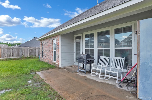 view of patio with a grill