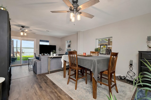 14070 Rucker St, Azle, TX 76020 - dining space with ceiling fan and wood finished floors