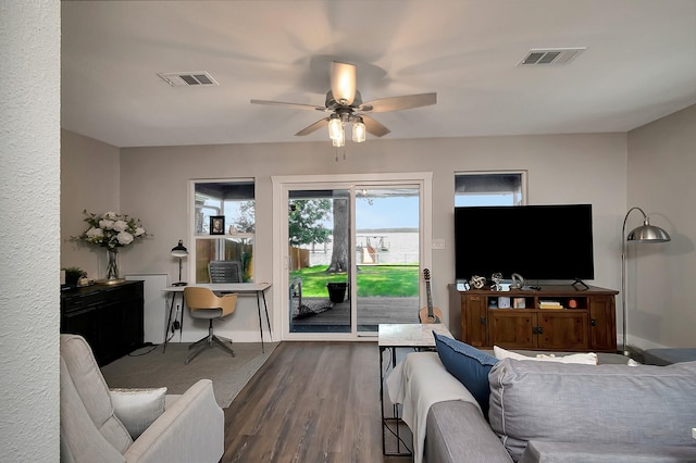 14070 Rucker St, Azle, TX 76020 - living room featuring ceiling fan, wood finished floors, and baseboards