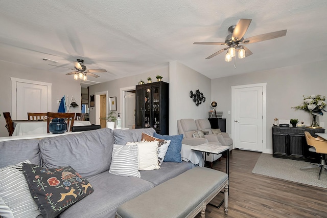 14070 Rucker St, Azle, TX 76020 - living area with a ceiling fan and dark wood finished floors