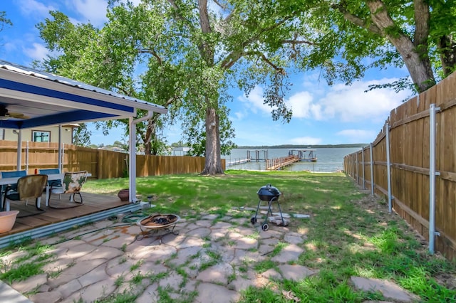 14070 Rucker St, Azle, TX 76020 - view of yard with an outdoor fire pit, a water view, a patio, and outdoor dining space