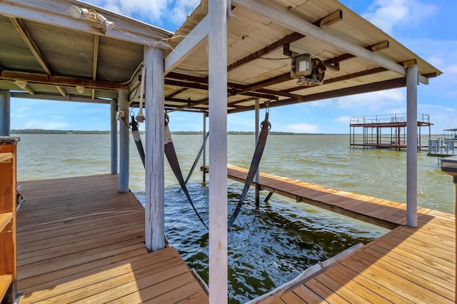 14070 Rucker St, Azle, TX 76020 - dock featuring boat lift and a water view