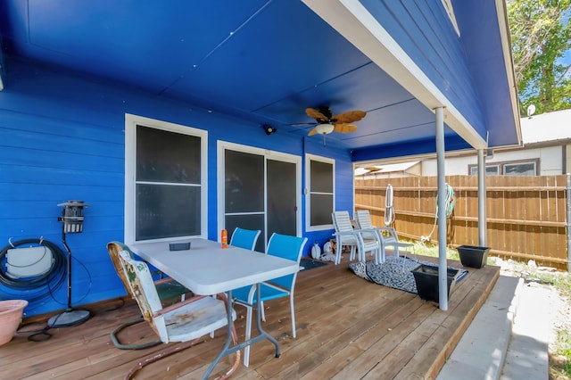 14070 Rucker St, Azle, TX 76020 - wooden terrace with a ceiling fan, fence, and outdoor dining space