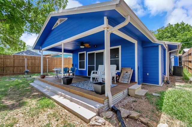 14070 Rucker St, Azle, TX 76020 - back of property with ceiling fan, a fenced backyard, a wooden deck, and central air condition unit