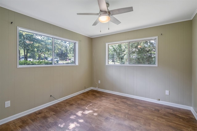 1621 Baseball Loop, Diana, TX 75640 - unfurnished room featuring wood finished floors, ceiling fan, baseboards, and ornamental molding