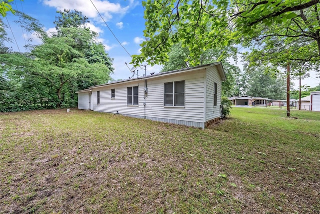 1621 Baseball Loop, Diana, TX 75640 - rear view of property with a yard