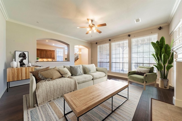 1364 Aubrey Ln, Frisco, TX 75033 - living area featuring a ceiling fan, arched walkways, light wood finished floors, baseboards, and ornamental molding