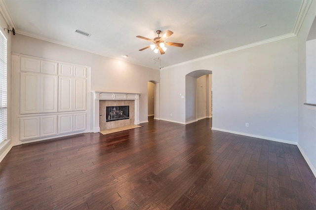 1364 Aubrey Ln, Frisco, TX 75033 - unfurnished living room with a ceiling fan, arched walkways, dark wood-style floors, baseboards, and ornamental molding