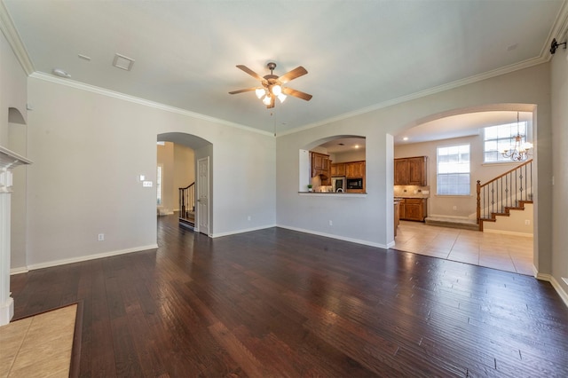 1364 Aubrey Ln, Frisco, TX 75033 - unfurnished living room featuring stairway, ceiling fan, wood-type flooring, ornamental molding, and baseboards