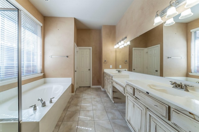 1364 Aubrey Ln, Frisco, TX 75033 - bathroom featuring a bath, tile patterned floors, and double vanity