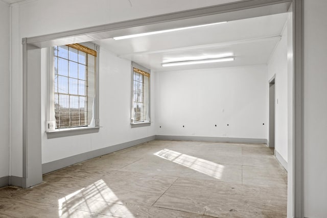 301 N Jefferson, Mount Pleasant, TX 75455 - empty room with baseboards