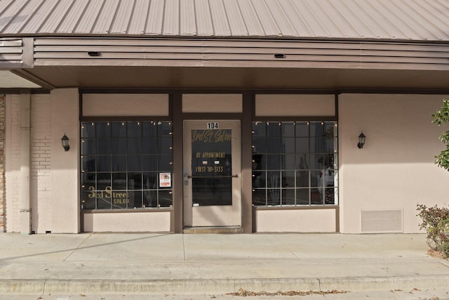 301 N Jefferson, Mount Pleasant, TX 75455 - property entrance with metal roof