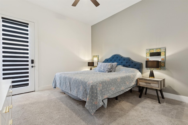 carpeted bedroom featuring baseboards and a ceiling fan