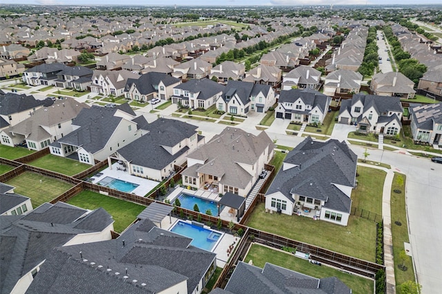 aerial view of residential area with a pool area