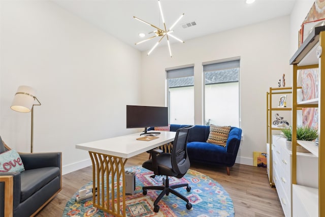 home office featuring a chandelier, light wood-style floors, baseboards, and recessed lighting