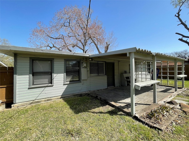 rear view of property with a patio area