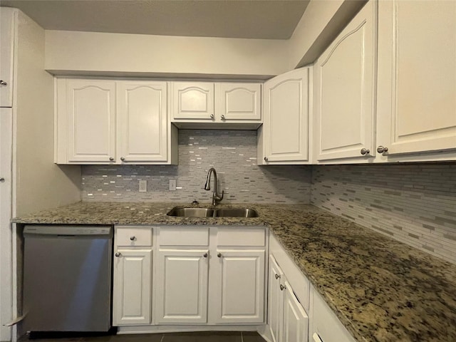 kitchen featuring dishwasher, a sink, backsplash, and stone counters