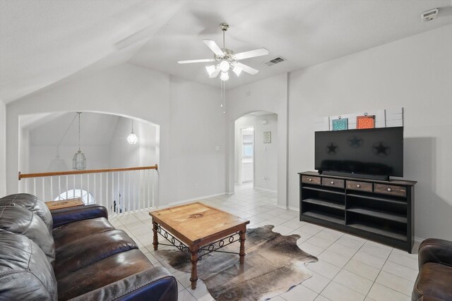 bedroom featuring dark carpet, lofted ceiling, baseboards, and ceiling fan