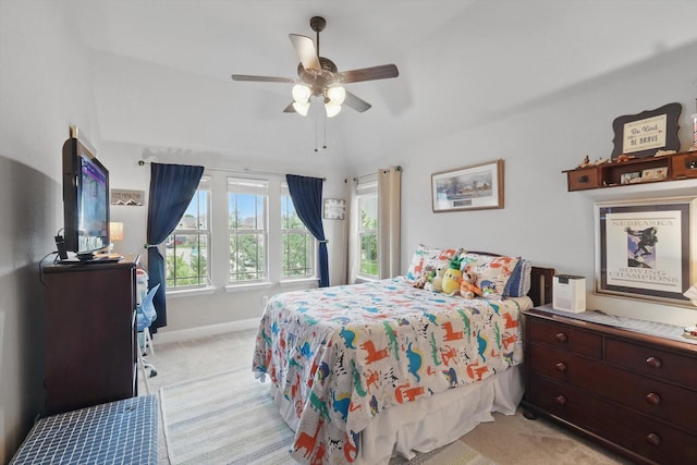 bedroom featuring light carpet, baseboards, and a ceiling fan