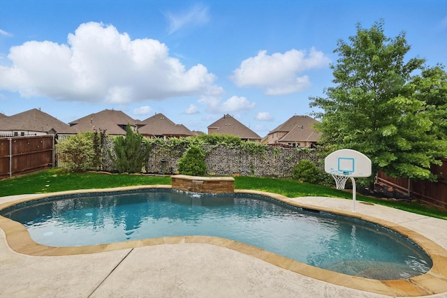 view of pool with a residential view