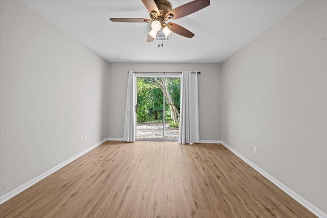 3205 Creekwood Cir, Waco, TX 76710 - empty room with wood finished floors, baseboards, and a ceiling fan