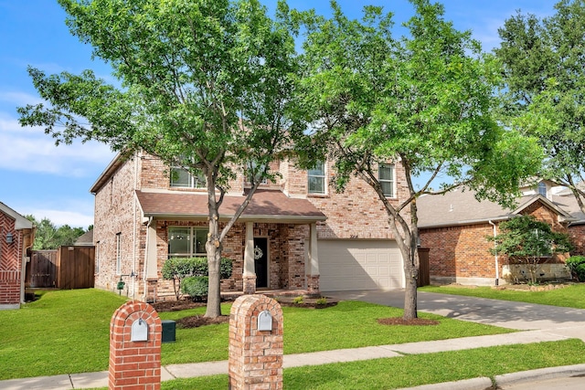 traditional-style house featuring concrete driveway, brick siding, and a garage