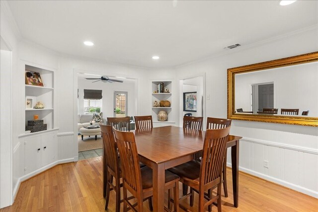 3501 Bristol Rd, Fort Worth, TX 76107 - dining area featuring built in shelves, light wood finished floors, a ceiling fan, ornamental molding, and recessed lighting