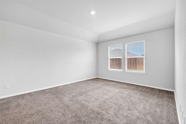 16509 Portage St, Justin, TX 76247 - carpeted spare room featuring baseboards and lofted ceiling