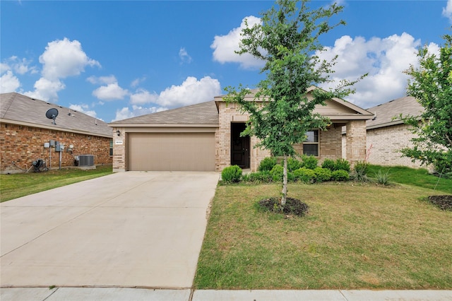 16509 Portage St, Justin, TX 76247 - ranch-style house featuring a garage, brick siding, driveway, and a front lawn