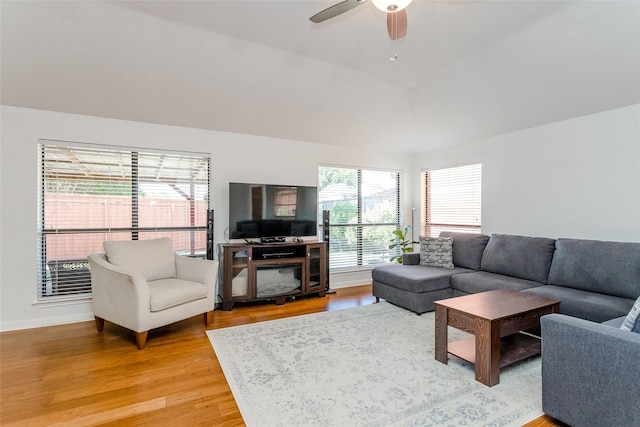 3841 Beaumont Ln, Plano, TX 75023 - living area with light wood-style floors, a ceiling fan, and baseboards