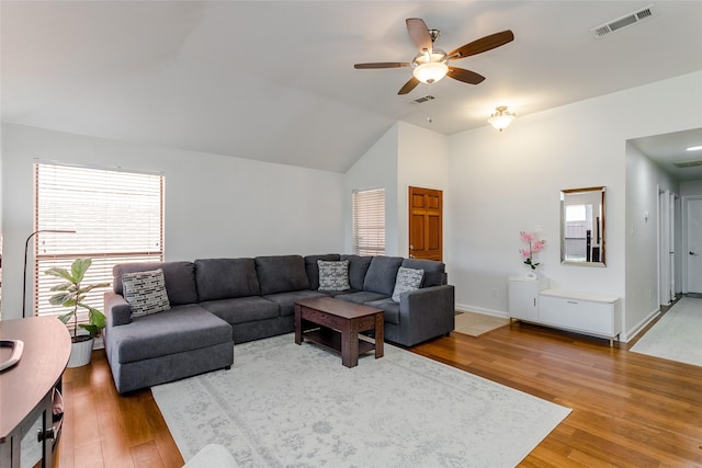 3841 Beaumont Ln, Plano, TX 75023 - living room with wood finished floors, ceiling fan, vaulted ceiling, and baseboards
