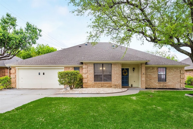 ranch-style home featuring a garage, driveway, a front yard, and brick siding