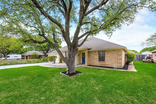 ranch-style home featuring brick siding, driveway, a shingled roof, and an attached garage