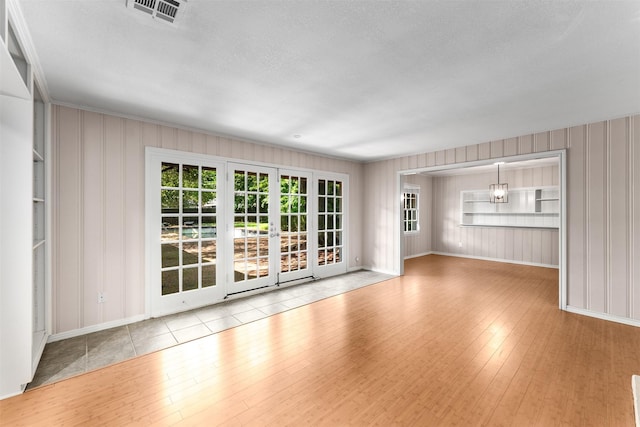 6838 Lupton Dr, Dallas, TX 75225 - empty room with baseboards and wood finished floors