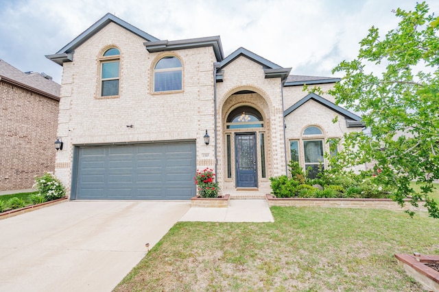 1305 Summer Ln, Mckinney, TX 75071 - french country style house featuring brick siding, an attached garage, driveway, and a front lawn