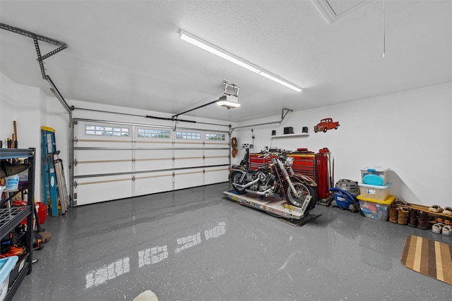 garage featuring a garage door opener