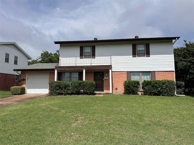 1664 Poplar Dr, Mesquite, TX 75149 - traditional-style home with brick siding, a garage, driveway, and a front yard