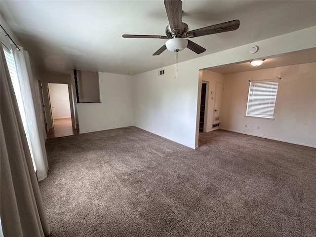 1664 Poplar Dr, Mesquite, TX 75149 - empty room featuring carpet, ceiling fan, and baseboards