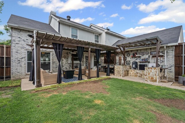 7012 Fox Dr, The Colony, TX 75056 - rear view of house with a patio