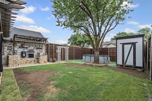 7012 Fox Dr, The Colony, TX 75056 - view of yard with a storage shed and an outbuilding