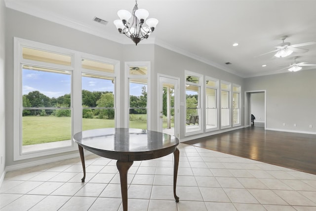 dining space with a chandelier, light tile patterned floors, ornamental molding, baseboards, and recessed lighting