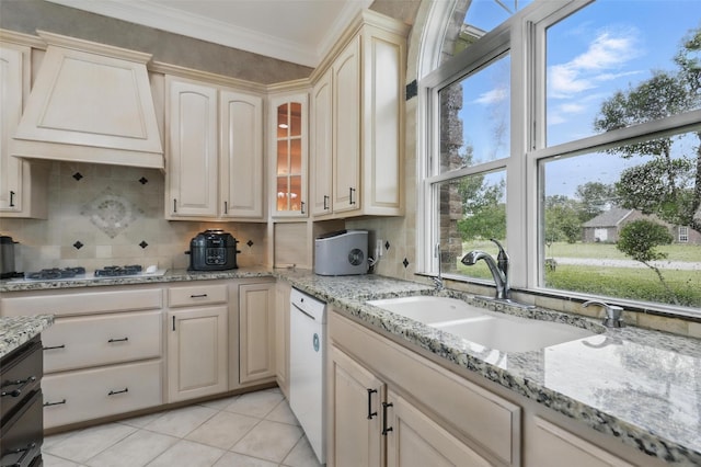 kitchen with custom exhaust hood, a sink, white appliances, crown molding, and backsplash