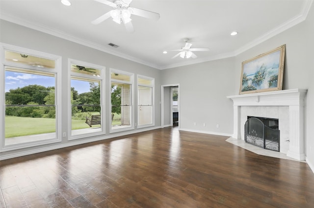 unfurnished living room with a ceiling fan, wood finished floors, ornamental molding, a fireplace, and recessed lighting